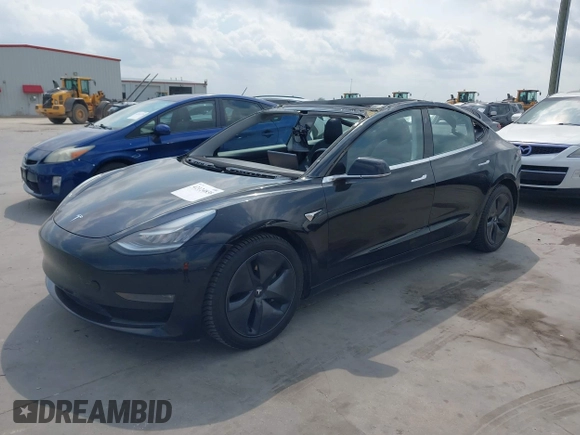 2018 Tesla Model 3 Long Range Battery z VIN 5YJ3E1EB3JF178812, wystawiony jako IAAI lot #42124838 z przebiegiem 124 229 mil mil oraz . Historia ofert i sprzedaży dostępna na DreamBid. Obrazek 2.