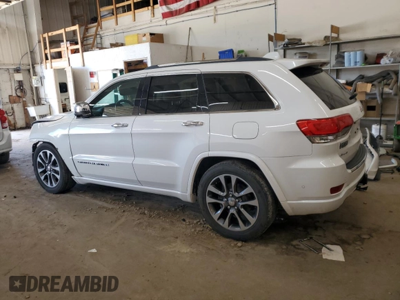 2017 Jeep Grand Cherokee Overland z VIN 1C4RJFCG8HC809868, wystawiony jako Copart lot #64056155 z przebiegiem 54 136 mil mil oraz Szkoda całkowita • Salvage title. Historia ofert i sprzedaży dostępna na DreamBid. Obrazek 2.