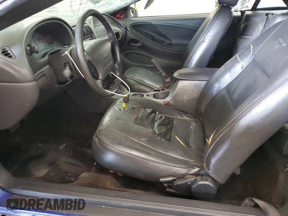 2004 Ford Mustang Deluxe with VIN 1FAFP44684F189081, listed as a Copart auction lot 59474985 with 249,812 mi miles and Salvage title. Bid and sale history available at DreamBid. Image 7.