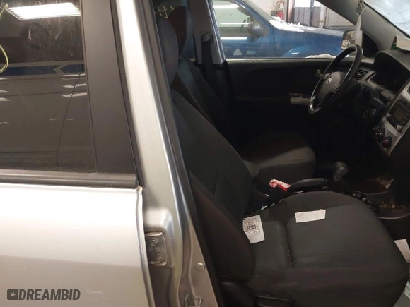 2009 Kia Sportage LX with VIN KNDJE723097571708, listed as a IAAI auction lot 41494118 with 140,869 mi miles. Bid and sale history available at carsss.com. Image 5.