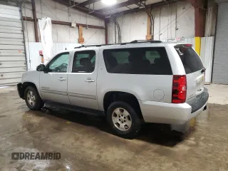 2013 Chevrolet Suburban LT with VIN 1GNSKJE76DR119873, listed as a Copart auction lot 53239445 with 197,172 mi miles and Salvage Title. Bid and sale history available at DreamBid. Image 2.