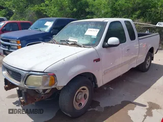 2003 Ford F-150 XL with VIN 1FTRX17243KA96403, listed as a IAAI auction lot 42017173 with 195,120 mi miles. Bid and sale history available at carsss.com. Image 2.
