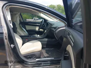 2017 Ford Fusion Titanium with VIN 3FA6P0D92HR252476, listed as a IAAI auction lot 40176942 with 88,818 mi miles and . Bid and sale history available at DreamBid. Image 5.