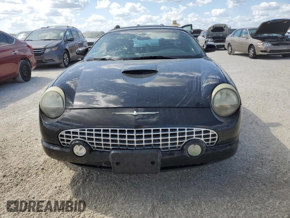 2002 Ford Thunderbird Hardtop Premium with VIN 1FAHP60A12Y120989, listed as a Copart auction lot 77573084 with Not Provided miles and Salvage Title. Bid and sale history available at DreamBid. Image 5.