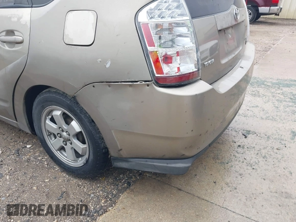2009 Toyota Prius with VIN JTDKB20U797877381, listed as a IAAI auction lot 42180399 with 265,623 mi miles. Bid and sale history available at carsss.com. Image 6.