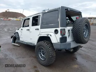 2015 Jeep Wrangler Unlimited Sahara with VIN 1C4BJWEG5FL518191, listed as a IAAI auction lot 41914581 with 107,433 mi miles. Bid and sale history available at carsss.com. Image 3.