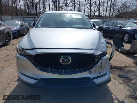 2020 Mazda CX-5 Touring with VIN JM3KFBCM3L0791816, listed as a IAAI auction lot 41761623 with 87,742 mi miles and . Bid and sale history available at carsss.com. Image 12.