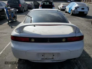 1999 Mitsubishi 3000GT z VIN JA3AM44H2XY002634, wystawiony jako Copart lot #73501144 z przebiegiem 70 229 mil mil oraz Tytuł czysty. Historia ofert i sprzedaży dostępna na DreamBid. Obrazek 6.