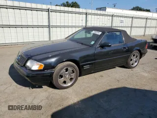 1999 Mercedes-Benz SL-Class with VIN WDBFA68F1XF184891, listed as a Copart auction lot 77082284 with 96,379 mi miles and Salvage Title. Bid and sale history available at carsss.com. Image 1.