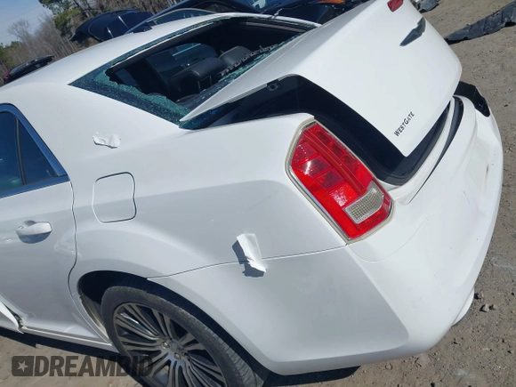 2013 Chrysler 300 with VIN 2C3CCABGXDH699096, listed as a IAAI auction lot 41614034 with 136,344 mi miles. Bid and sale history available at carsss.com. Image 18.