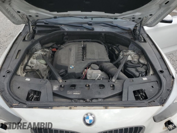2014 BMW 5 Series 535i xDrive z VIN WBA5M4C59ED183761, wystawiony jako Copart lot #56480305 z przebiegiem 76 060 mil mil oraz Szkoda całkowita • Salvage title. Historia ofert i sprzedaży dostępna na DreamBid. Obrazek 12.