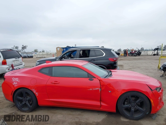 2017 Chevrolet Camaro 1LT z VIN 1G1FB1RS5H0169949, wystawiony jako IAAI lot #42177915 z przebiegiem 68 633 mil mil oraz . Historia ofert i sprzedaży dostępna na DreamBid. Obrazek 13.