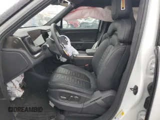 2023 Rivian R1S Adventure z VIN 7PDSGBBA2PN026420, wystawiony jako Copart lot #55331045 z przebiegiem 29 938 mil mil oraz Szkoda całkowita • Salvage title. Historia ofert i sprzedaży dostępna na DreamBid. Obrazek 7.