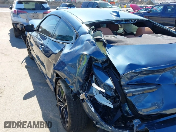 2021 BMW 4 Series 430i z VIN WBA53AP08MCG09446, wystawiony jako IAAI lot #41664926 z przebiegiem 18 544 mil mil oraz . Historia ofert i sprzedaży dostępna na DreamBid. Obrazek 19.