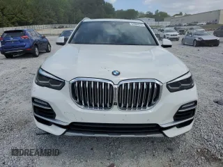 2021 BMW X5 xDrive40i z VIN 5UXCR6C07M9H21128, wystawiony jako Copart lot #54084915 z przebiegiem 26 966 mil mil oraz Szkody całkowita. Historia ofert i sprzedaży dostępna na DreamBid. Obrazek 5.