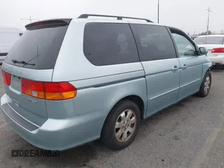 2003 Honda Odyssey EX-L with VIN 5FNRL18943B138444, listed as a IAAI auction lot 41498605 with 153,947 mi miles and . Bid and sale history available at DreamBid. Image 4.