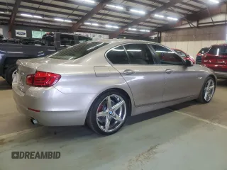2013 BMW 5 Series 535i xDrive with VIN WBAFU7C57DDU74909, listed as a Copart auction lot 64053715 with 115,521 mi miles and Clean title. Bid and sale history available at DreamBid. Image 3.