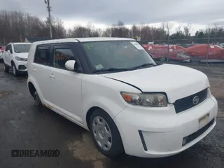2010 Scion xB with VIN JTLZE4FE3A1114187, listed as a IAAI auction lot 41968144 with 1,555,689 mi miles. Bid and sale history available at carsss.com. Image 1.