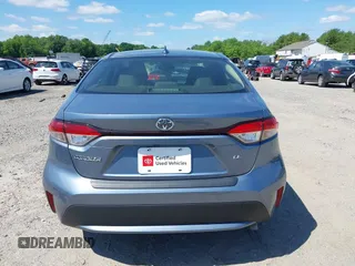 2021 Toyota Corolla LE with VIN JTDEPMAE7MJ144664, listed as a IAAI auction lot 42269698 with 23,500 mi miles and . Bid and sale history available at DreamBid. Image 17.