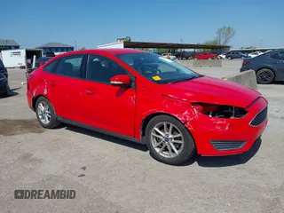 2016 Ford Focus SE with VIN 1FADP3F2XGL205797, listed as a IAAI auction lot 41987209 with 129,042 mi miles. Bid and sale history available at carsss.com. Image 6.