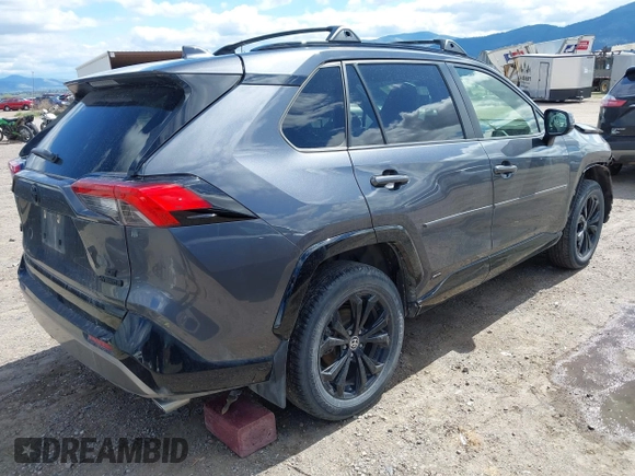 2022 Toyota RAV4 Hybrid SE with VIN JTM16RFV0ND070012, listed as a IAAI auction lot 42244604 with 22,740 mi miles and . Bid and sale history available at DreamBid. Image 4.