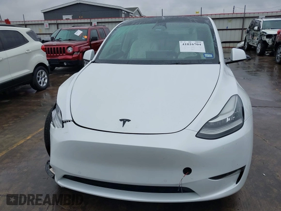 2022 Tesla Model Y Long Range with VIN 7SAYGDEE3NF380067, listed as a IAAI auction lot 41016704 with 52,180 mi miles and . Bid and sale history available at DreamBid. Image 12.