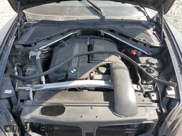 2012 BMW X5 35i with VIN 5UXZV4C54CL985119, listed as a Copart auction lot 56856735 with Not provided miles and Salvage title. Bid and sale history available at DreamBid. Image 12.