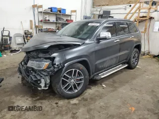 2017 Jeep Grand Cherokee Limited 75th Anniversary with VIN 1C4RJFBG7HC942963, listed as a Copart auction lot 86825454 with 169,227 mi miles and Salvage title. Bid and sale history available at DreamBid. Image 1.