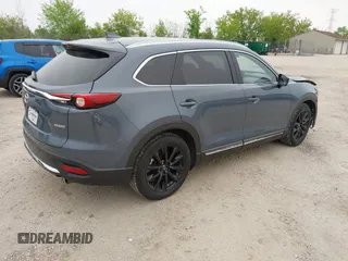 2023 Mazda CX-9 Grand Touring with VIN JM3TCBDY2P0636226, listed as a IAAI auction lot 42384360 with 161,352 mi miles and . Bid and sale history available at DreamBid. Image 4.