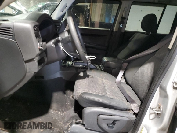 2009 Jeep Commander Sport z VIN 1J8HG48K09C526337, wystawiony jako Copart lot #89026135 z przebiegiem 194 514 mil mil oraz Szkoda całkowita • Salvage title. Historia ofert i sprzedaży dostępna na DreamBid. Obrazek 7.