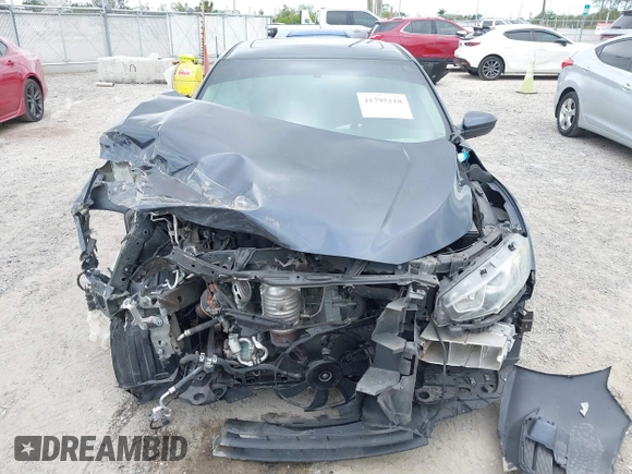 2018 Honda Civic EX with VIN 19XFC2F75JE035935, listed as a IAAI auction lot 41795110 with 92,687 mi miles and . Bid and sale history available at DreamBid. Image 6.