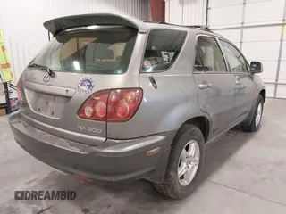 2000 Lexus RX 300 z VIN JT6HF10U6Y0129714, wystawiony jako IAAI lot #41641164 z przebiegiem 174 537 mil mil oraz . Historia ofert i sprzedaży dostępna na DreamBid. Obrazek 4.