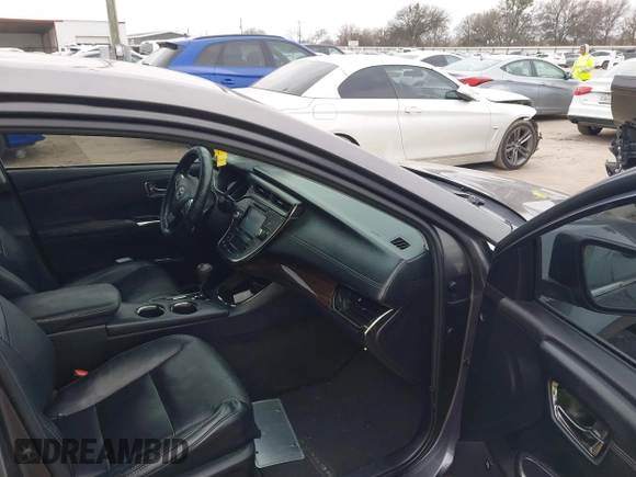 2015 Toyota Avalon Limited with VIN 4T1BK1EB4FU167011, listed as a IAAI auction lot 41582722 with 77,314 mi miles and . Bid and sale history available at DreamBid. Image 5.