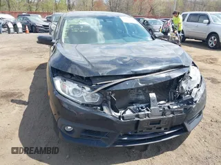 2017 Honda Civic EX-L z VIN 2HGFC1F72HH647147, wystawiony jako IAAI lot #42064784 z przebiegiem 139 893 mil mil oraz . Historia ofert i sprzedaży dostępna na DreamBid. Obrazek 17.