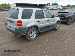 2003 Ford Escape XLT Popular z VIN 1FMYU03193KB02834, wystawiony jako IAAI lot #42423365 z przebiegiem 350 065 mil mil oraz . Historia ofert i sprzedaży dostępna na DreamBid. Obrazek 4.