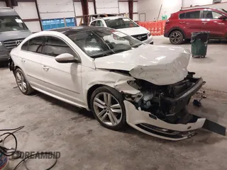 2014 Volkswagen CC Lux with VIN WVWRP7AN9EE519502, listed as a IAAI auction lot 41458158 with 85,988 mi miles. Bid and sale history available at carsss.com. Image 1.