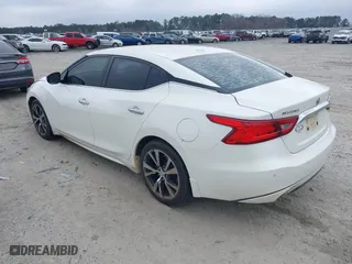 2016 Nissan Maxima 3.5 SL with VIN 1N4AA6AP2GC423595, listed as a IAAI auction lot 41490962 with 192,727 mi miles. Bid and sale history available at carsss.com. Image 3.