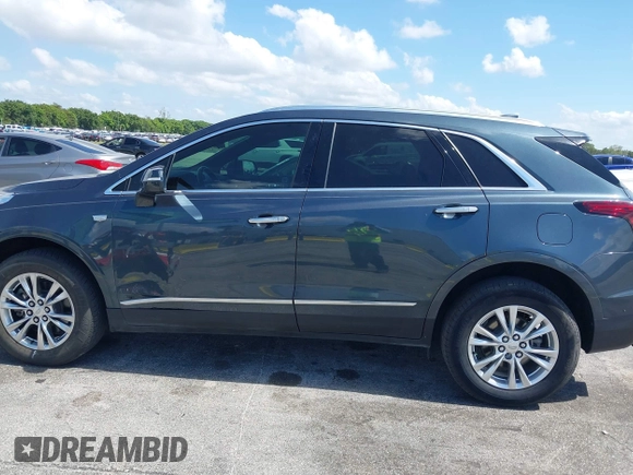 2020 Cadillac XT5 Luxury FWD z VIN 1GYKNAR45LZ224459, wystawiony jako IAAI lot #42295055 z przebiegiem 69 751 mil mil oraz . Historia ofert i sprzedaży dostępna na DreamBid. Obrazek 14.