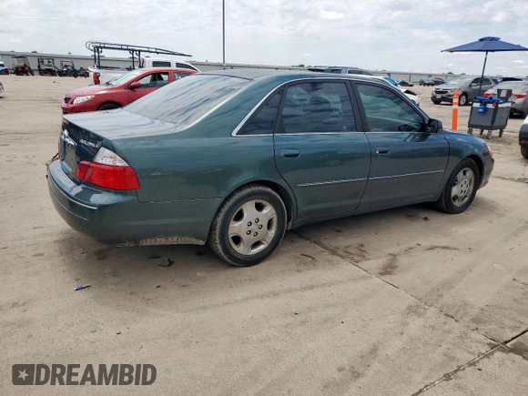 2003 Toyota Avalon XL z VIN 4T1BF28BX3U310285, wystawiony jako Copart lot #57664375 z przebiegiem 179 727 mil mil oraz Szkoda całkowita • Salvage title. Historia ofert i sprzedaży dostępna na DreamBid. Obrazek 3.