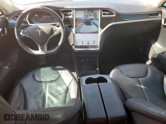 2014 Tesla Model S 60 z VIN 5YJSA1H19EFP27946, wystawiony jako Copart lot #61284625 z przebiegiem 109 147 mil mil oraz Szkoda całkowita • Salvage title. Historia ofert i sprzedaży dostępna na DreamBid. Obrazek 8.