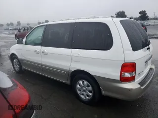 2005 Kia Sedona LX with VIN KNDUP132356753784, listed as a Copart auction lot 85112374 with 169,123 mi miles and Salvage Title. Bid and sale history available at carsss.com. Image 2.