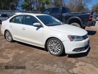2013 Volkswagen Jetta TDI w/Premium with VIN 3VW3L7AJ4DM361445, listed as a IAAI auction lot 41735571 with 133,894 mi miles and . Bid and sale history available at DreamBid. Image 1.
