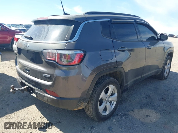 2018 Jeep Compass Altitude with VIN 3C4NJDBB2JT230751, listed as a IAAI auction lot 41671850 with 253,221 mi miles and . Bid and sale history available at carsss.com. Image 4.