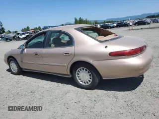 1996 Mercury Sable LS z VIN 1MELM53S8TA610706, wystawiony jako Copart lot #59506535 z przebiegiem 64 513 mil mil oraz Tytuł czysty. Historia ofert i sprzedaży dostępna na DreamBid. Obrazek 2.