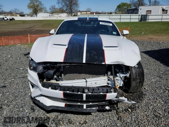 2021 Ford Mustang GT z VIN 1FA6P8CF5M5118306, wystawiony jako Copart lot #52409455 z przebiegiem 16 033 mil mil oraz Szkody całkowita. Historia ofert i sprzedaży dostępna na DreamBid. Obrazek 5.