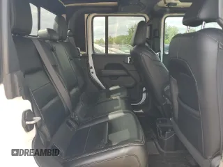 2020 Jeep Gladiator Overland z VIN 1C6HJTFG6LL135872, wystawiony jako Copart lot #59249895 z przebiegiem 113 519 mil mil oraz Czysty tytuł • Clean title. Historia ofert i sprzedaży dostępna na DreamBid. Obrazek 11.
