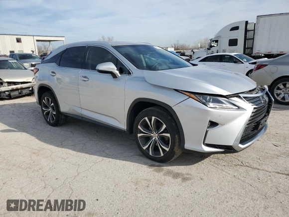 2017 Lexus RX with VIN 2T2BZMCA8HC094328, listed as a Copart auction lot 85038414 with 124,485 mi miles and Salvage Title. Bid and sale history available at carsss.com. Image 4.