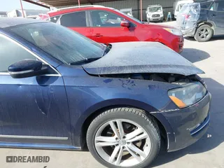 2013 Volkswagen Passat TDI SEL Premium with VIN 1VWCN7A33DC125396, listed as a IAAI auction lot 41862605 with 123,542 mi miles. Bid and sale history available at carsss.com. Image 13.