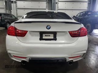 2014 BMW 4 Series 435i with VIN WBA3R1C52EK192076, listed as a Copart auction lot 60098595 with 89,504 mi miles and Salvage title. Bid and sale history available at DreamBid. Image 6.