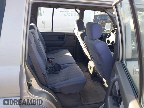 1998 Isuzu Trooper S with VIN JACDJ58X8W7912533, listed as a IAAI auction lot 41601845 with Not Provided miles and . Bid and sale history available at DreamBid. Image 8.